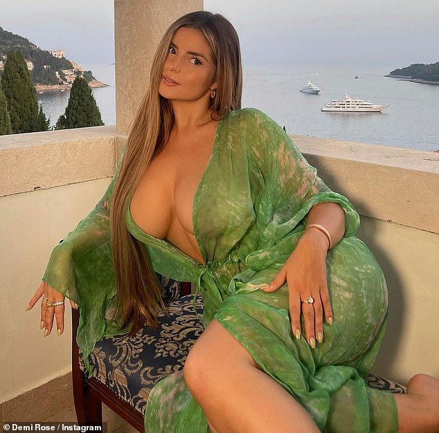 Demi Rose puts her VERY ample assets on display as she goes braless in a  plunging green kaftan | Daily Mail Online