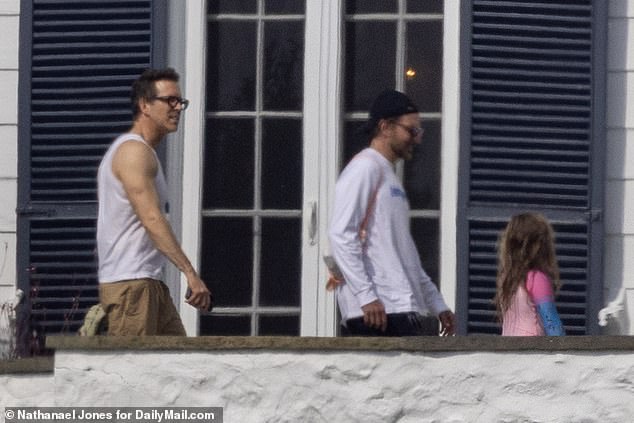 Blake Lively, Ryan Reynolds (left) Bradley Cooper (right) and Kylie Kelce are seen at Taylor Swift's house in Road Island on Sun., August, 25